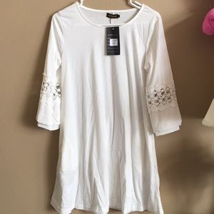 white Reborn lace blouse with pockets on the sides